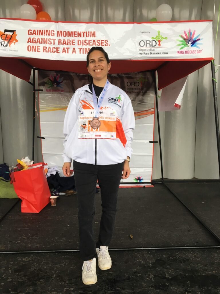 rare disease day race. woman speaking about her experience balancing rare disease with work and life.